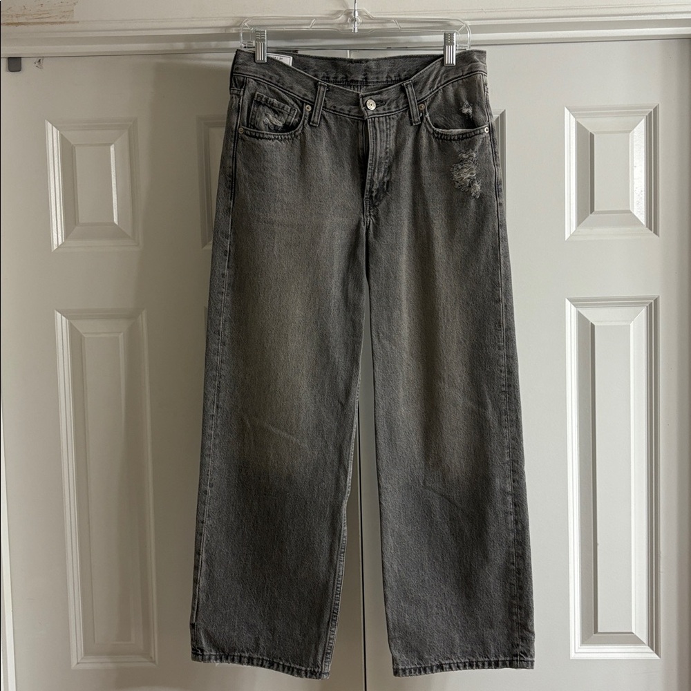 GAP LOW STRIDE JEANS. GREY WASH COLOR WITH SOME DISTRESSING. SIZE 26/2 SHORT.